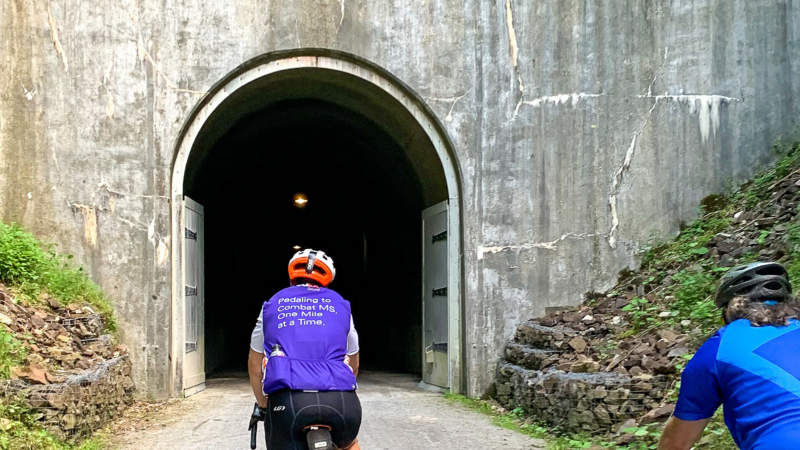 Cyclists entering Big Savage Tunnel